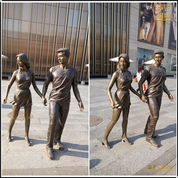 8商場(chǎng)門(mén)前情侶拉手銅雕塑.jpg